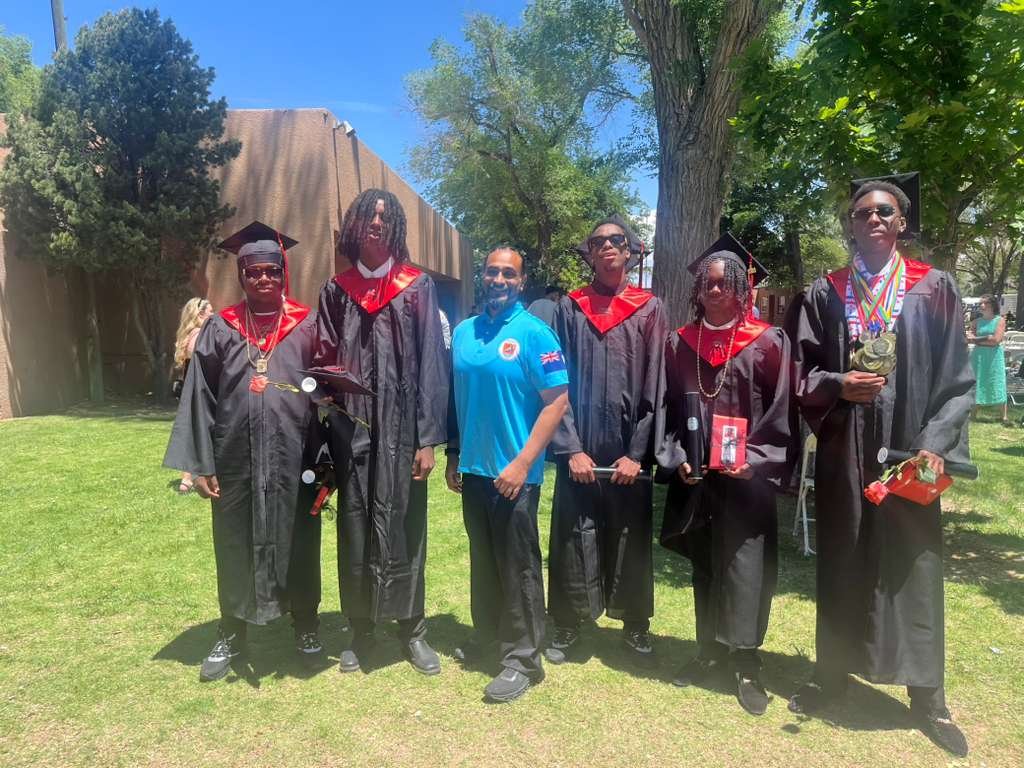 The five Anguillian graduates with Coach Najmuddin Pharoah Ahmad at Menaul High School